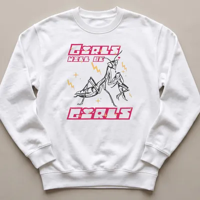 Bold cartoon design of a praying mantis with text 'Girls Will Be Girls' in pink and gold — printed on a unisex sweatshirt