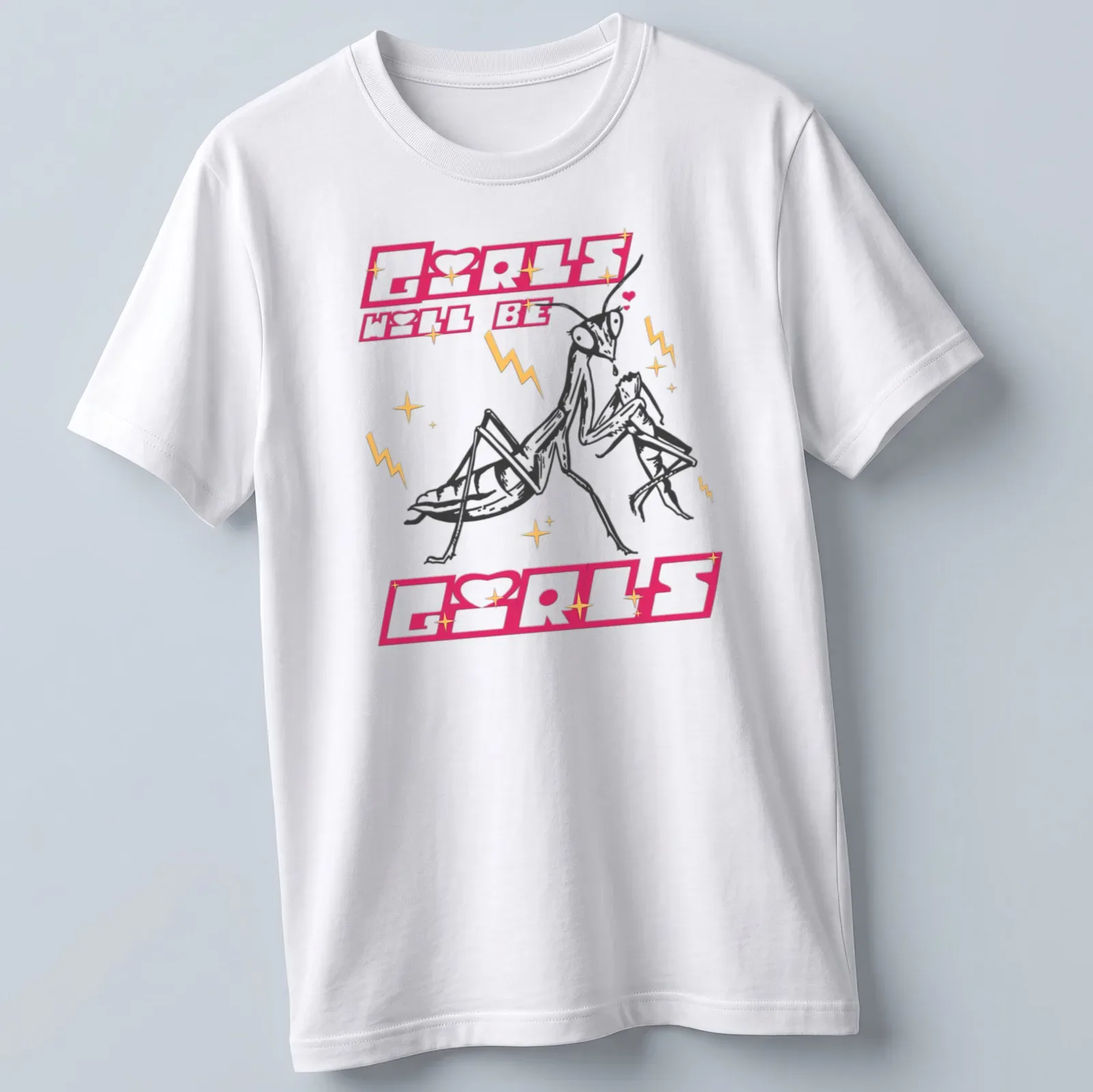 Bold cartoon design of a praying mantis with text 'Girls Will Be Girls' in pink and gold — printed on a unisex t-shirt
