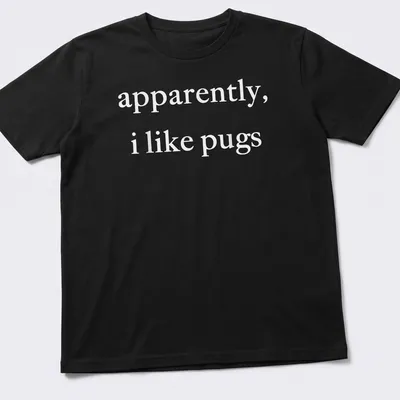 Simple text t-shirt with the phrase 'apparently, I like pugs' in white.