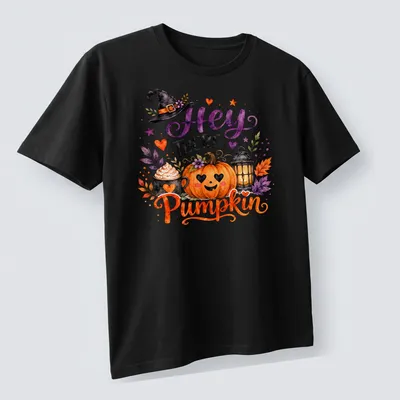 Watercolor print of a pumpkin, lantern, cupcake, and witch hat with the text 'Hey There Pumpkin' — printed on a unisex t-shirt (angled view)