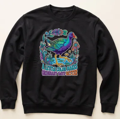 Illustration of a Purple Gallinule with vibrant colors and uplifting text — printed on a unisex sweatshirt