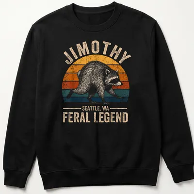 Vintage retro t-shirt featuring a raccoon and the text Jimothy Seattle, WA Feral Legend — printed on a unisex sweatshirt
