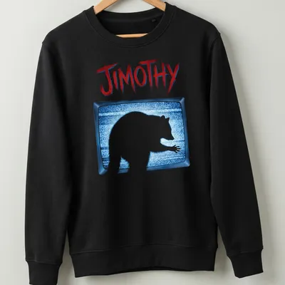 Raccoon silhouette in vintage TV static with the name Jimothy in bold text — printed on a unisex sweatshirt