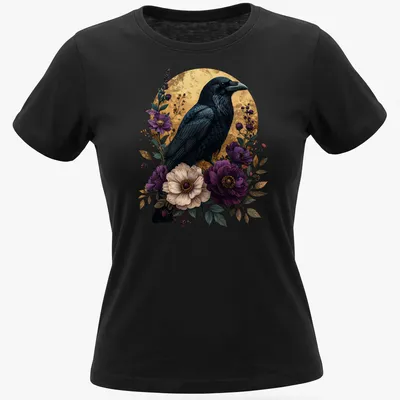 Gothic raven amidst vibrant purple flowers with green leaves — printed on a women's shirt