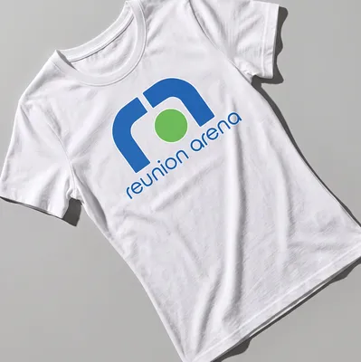 Modern minimalist Reunion Arena logo t-shirt in blue, green, and white — printed on a women's shirt
