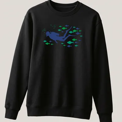Woodcut style graphic of a scuba diver swimming with fish in blue and green tones — printed on a unisex sweatshirt