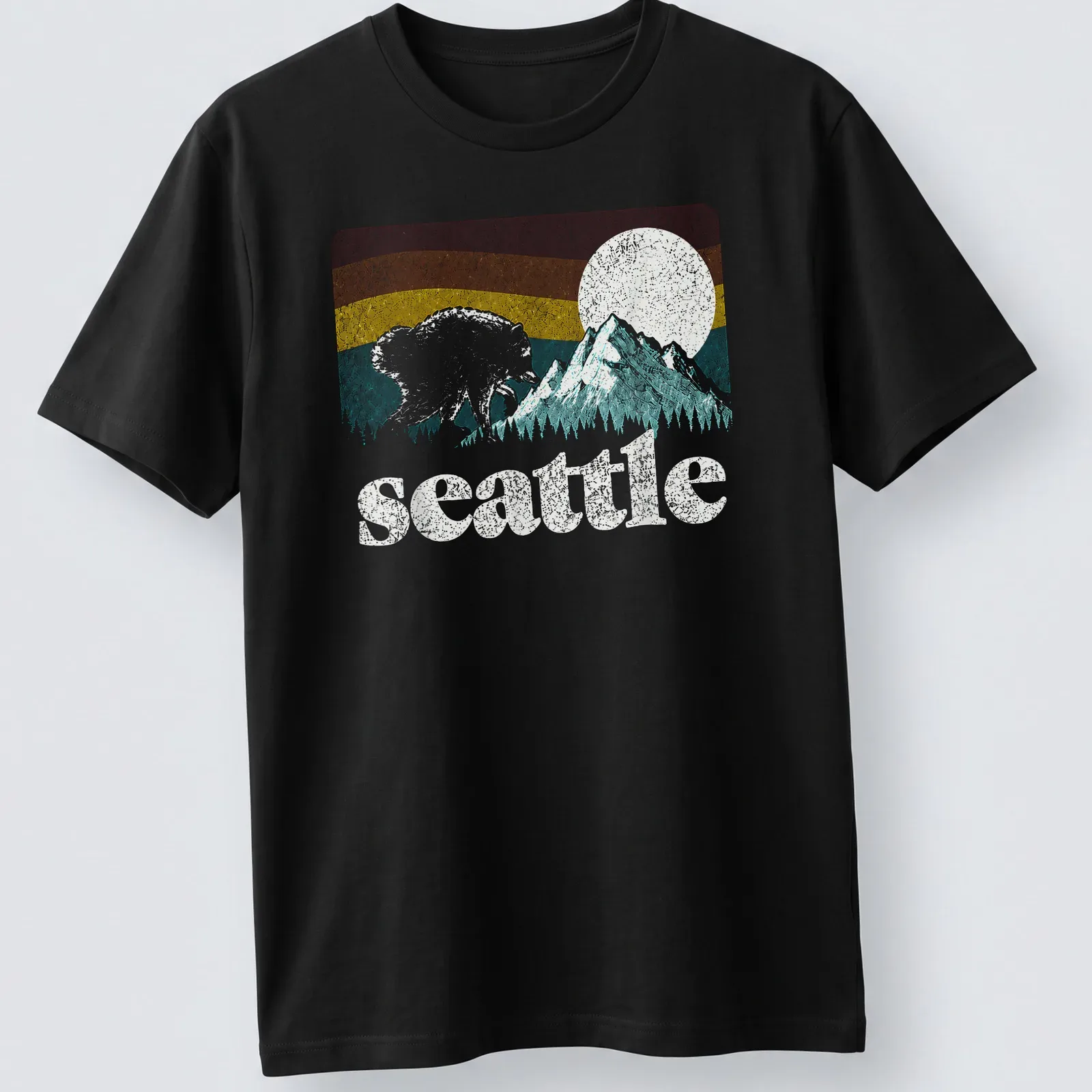 Retro bear graphic with Seattle text in pink, blue, yellow, and green — printed on a unisex t-shirt