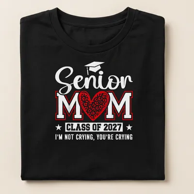 Bold Senior Mom T-shirt with leopard heart design and graduation text — printed on a women's shirt