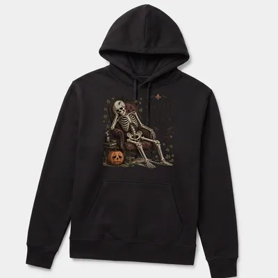 Vintage skeleton lounging in chair with 'Dead Tired' slogan in bold letters — printed on a unisex hoodie