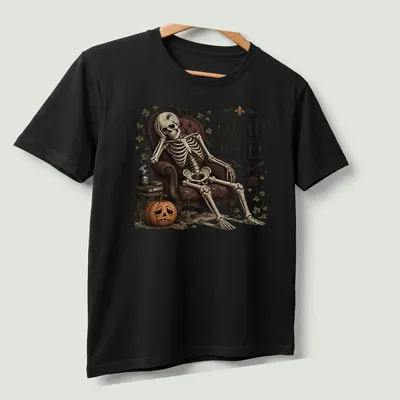 Vintage skeleton lounging in chair with 'Dead Tired' slogan in bold letters — printed on a unisex t-shirt (angled view)