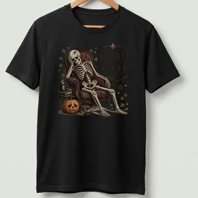 Vintage skeleton lounging in chair with 'Dead Tired' slogan in bold letters
