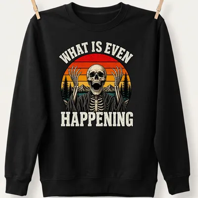 Retro sunset graphic with humorous skeleton and text saying 'What Is Even Happening' — printed on a unisex sweatshirt