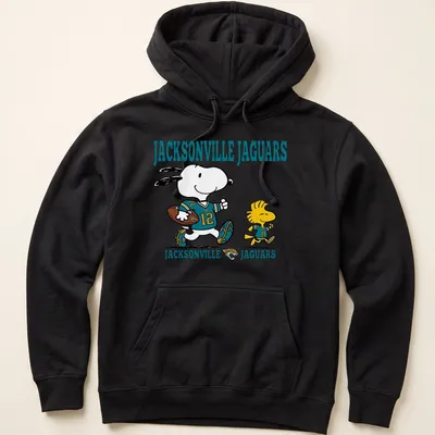 Cartoon Snoopy and Woodstock supporting the Jacksonville Jaguars in teal and black — printed on a unisex hoodie