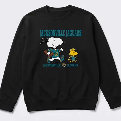 Cartoon Snoopy and Woodstock supporting the Jacksonville Jaguars in teal and black — printed on a unisex sweatshirt