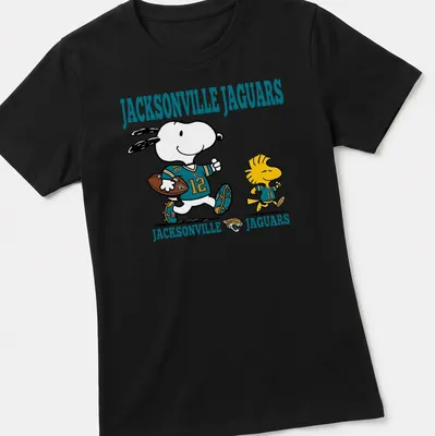 Cartoon Snoopy and Woodstock supporting the Jacksonville Jaguars in teal and black — printed on a women's shirt