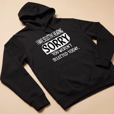 Bold typography shirt with the phrase 'SORRY YOU WEREN'T SELECTED TODAY' in black and white. — printed on a unisex hoodie