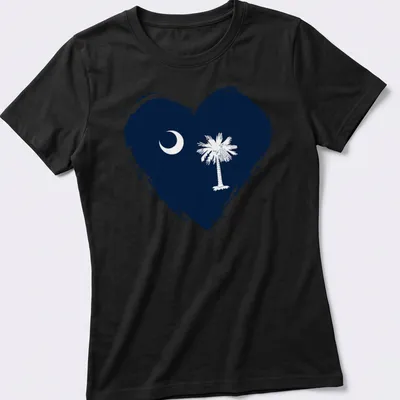 Distressed graphic of South Carolina flag heart featuring crescent moon and palm tree — printed on a women's shirt
