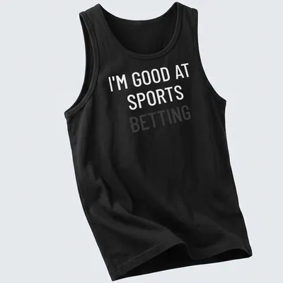 Bold typography t-shirt saying 'I'm Good At Sports Betting' in black on white. — printed on a tank top