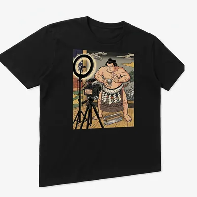 Illustration of a sumo wrestler making a foil ball in ukiyo-e style — printed on a unisex t-shirt (angled view)