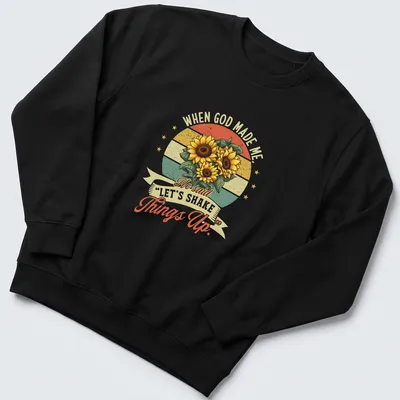 Vintage retro t-shirt featuring sunflowers and text about shaking things up. — printed on a unisex sweatshirt