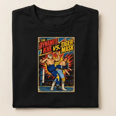 Vintage comic style t-shirt featuring a wrestling showdown between Dynamite Kid and Tiger Mask — printed on a women's shirt