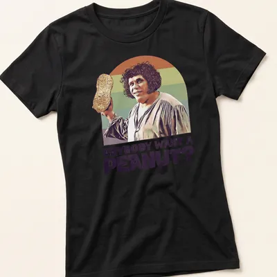 Vintage illustration of a character holding a peanut with playful text. — printed on a women's shirt