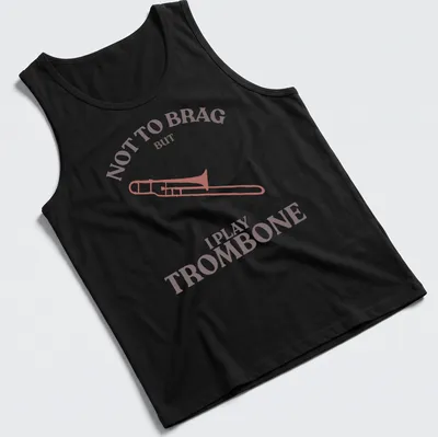 Illustration of a trombone with text: Not to Brag But I Play Trombone in pink, brown, and white — printed on a tank top