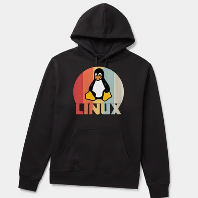 Retro T-shirt featuring the Tux Penguin and LINUX text in playful colors — printed on a unisex hoodie
