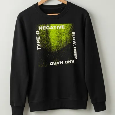 Grunge distressed Type O Negative t-shirt with bold band text in green and white — printed on a unisex sweatshirt