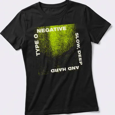 Grunge distressed Type O Negative t-shirt with bold band text in green and white — printed on a women's shirt