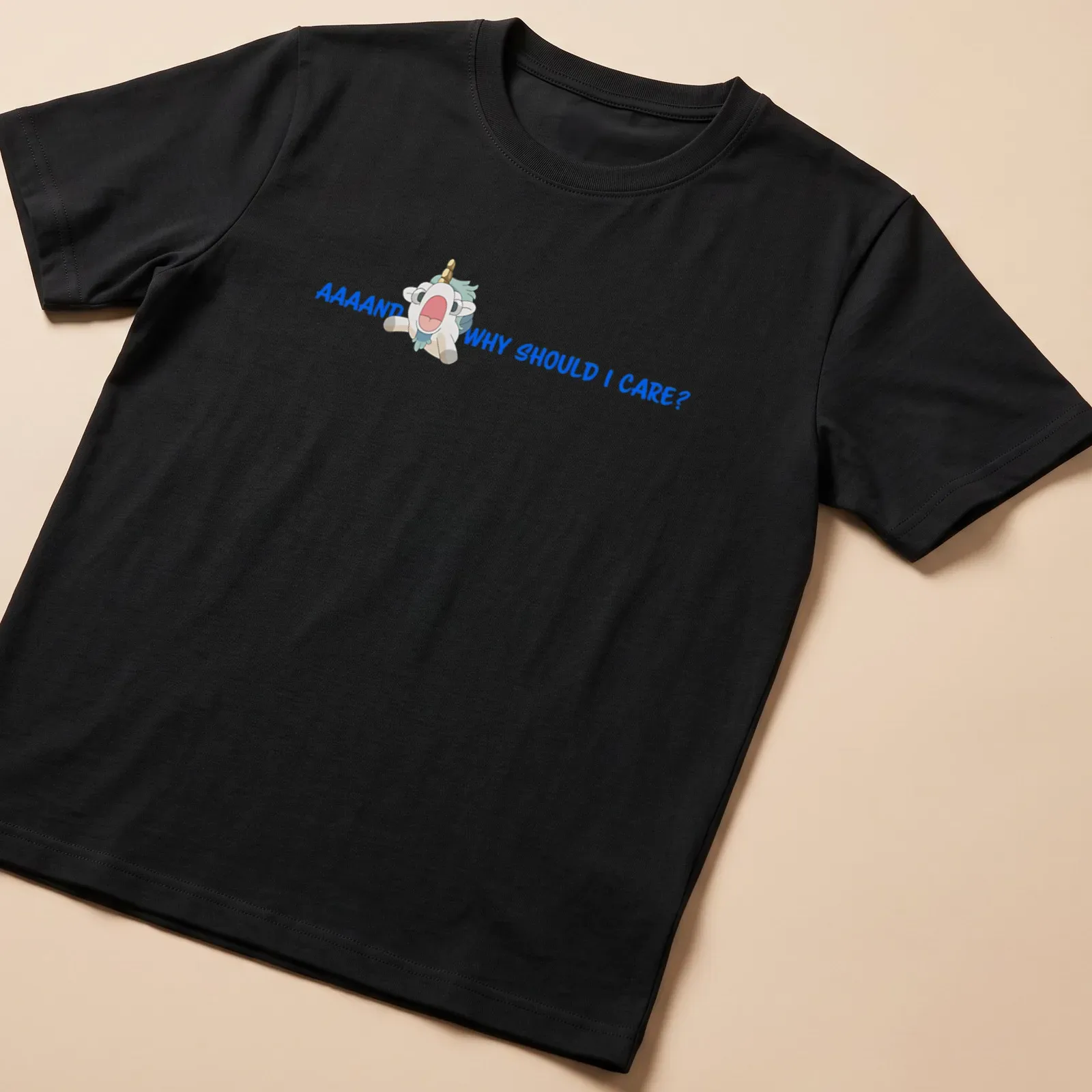 Kawaii unicorn design with playful text in blue and pastel colors. — printed on a unisex t-shirt