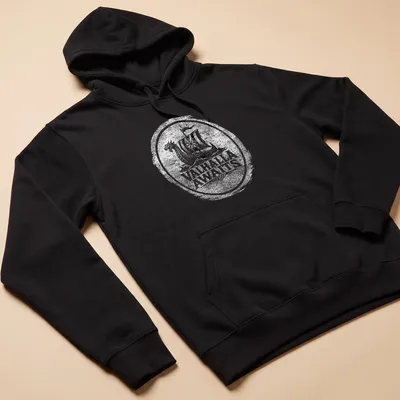 Viking ship design with 'Valhalla Awaits' text in black and white — printed on a unisex hoodie