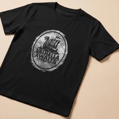 Viking ship design with 'Valhalla Awaits' text in black and white