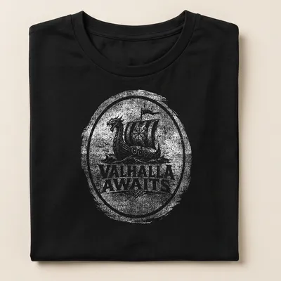 Viking ship design with 'Valhalla Awaits' text in black and white — printed on a women's shirt