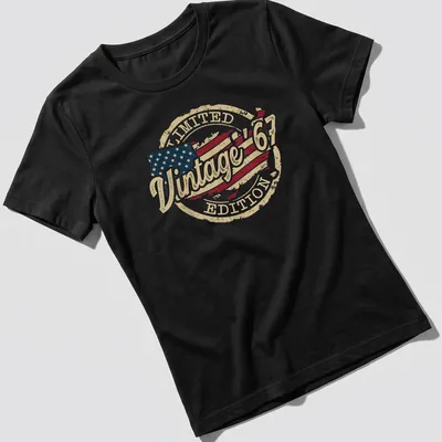 Vintage distressed American flag T-shirt with text: Vintage '67 LIMITED EDITION — printed on a women's shirt