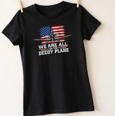Vintage airplane with American flag and distressed lettering design — printed on a women's shirt