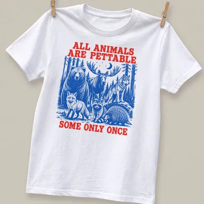 Vintage T-shirt featuring wildlife illustrations and humorous text about animals.