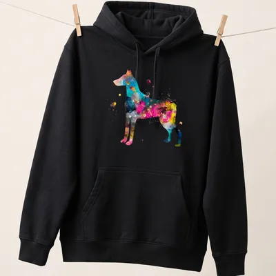Watercolor Doberman silhouette in blue, pink, yellow, black, and purple shades. — printed on a unisex hoodie
