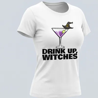 Cartoon design of a cocktail drink with the text Drink Up, Witches in purple and green — printed on a women's shirt