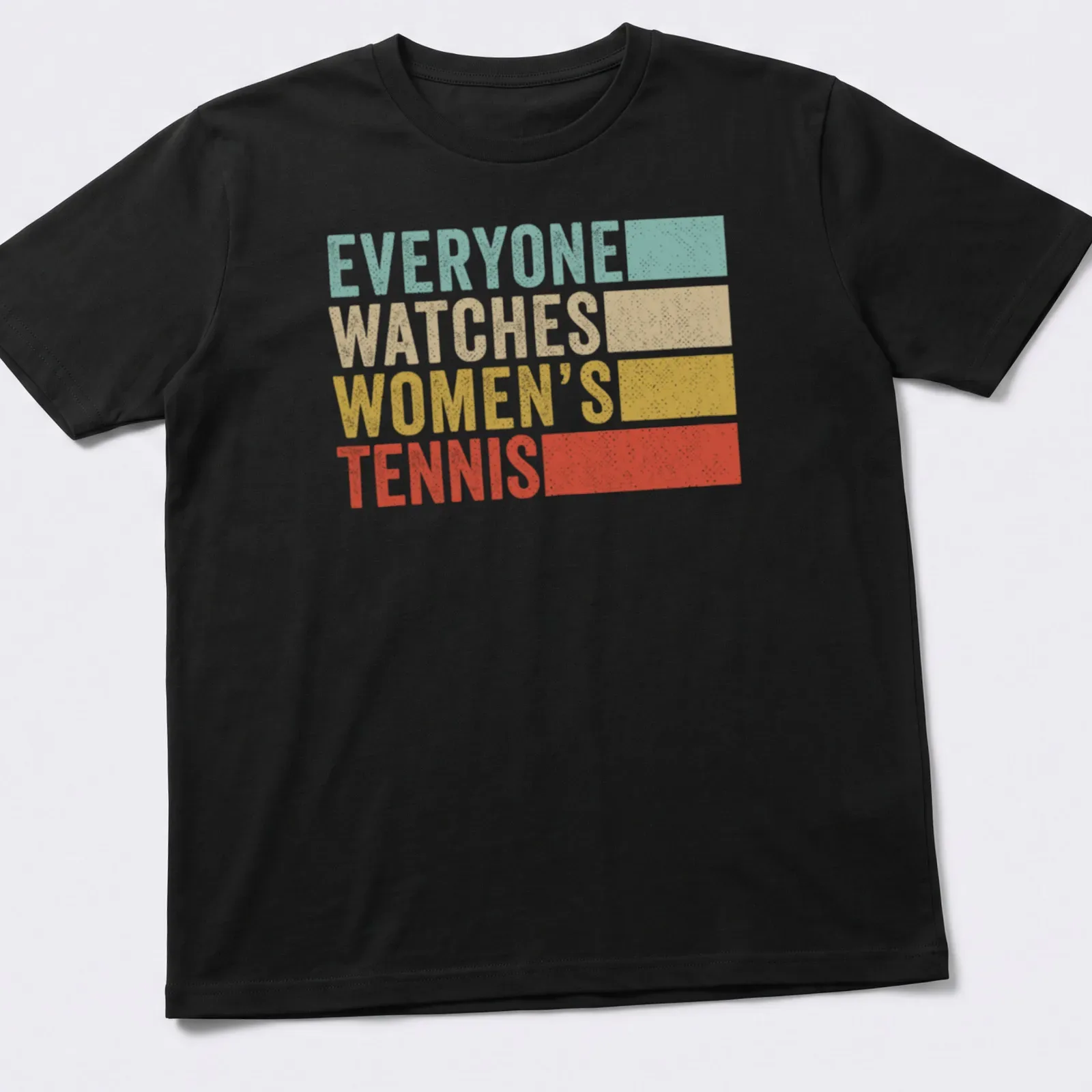 Retro distressed Women's Tennis t-shirt with bold text in light blue and mustard — printed on a unisex t-shirt